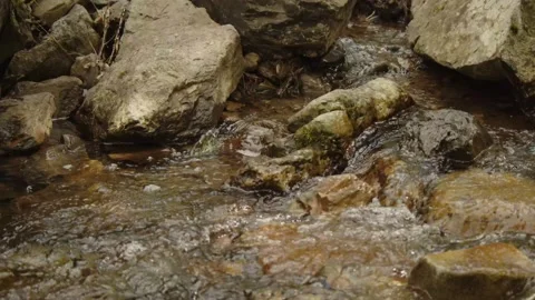 Clear water flowing on rocks Stock Footage 279662672