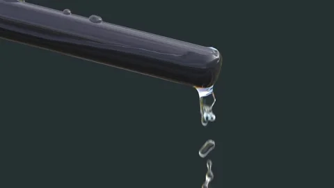 Clear water flows down the black rod Stock Footage 198238292