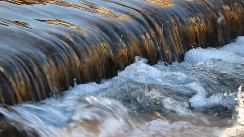 Clear water flows down the stream. Stock Footage 101415373