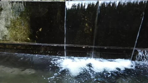 Clear Water Flows from the Pool Stock Footage 300241933