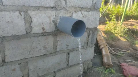 Clear water flows profusely from the irrigation pipes of the fields, Stock Footage 249393426
