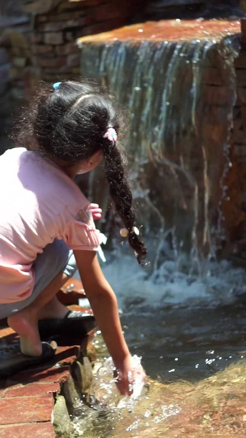 Clear water flows from the waterfall Stock Footage 253903150