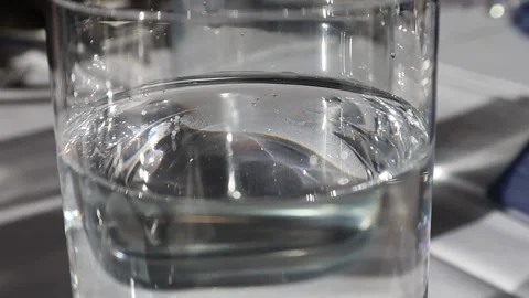 Clear Water Glass and Reflections Stock Footage 229458041