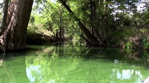 Clear water kayak floating Utopia Texas Sabinal river Stock Footage 53340626