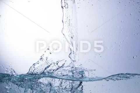 Clear water on a monochromatic background, abstraction Stock Photos