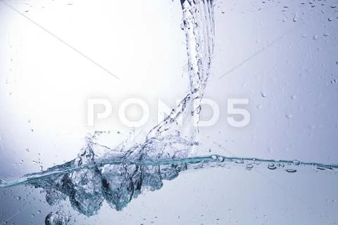 Clear water on a monochromatic background, abstraction Stock Photos
