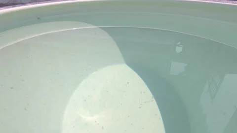 Clear Water Ripples in Ceramic Container with Sunlight Reflection Video stock 332942815