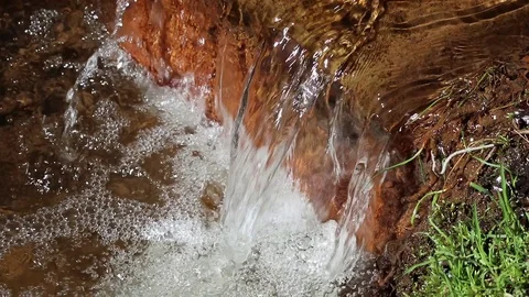 Clear water running in a ditch Stock Footage 108649677