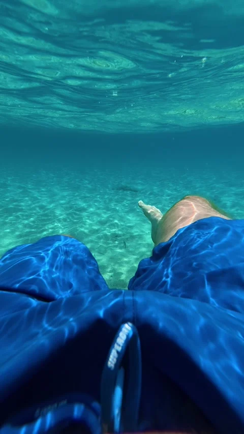 Clear water shimmers under sunlight. Kalogria, Greece. Vertical Stock Footage 338358484