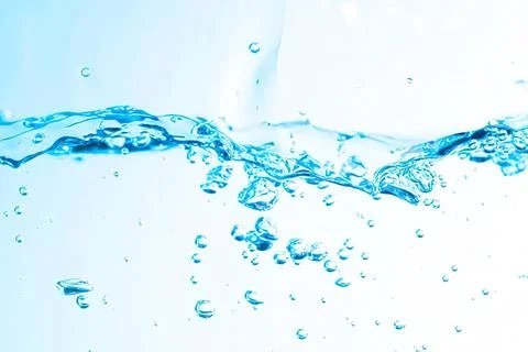 Clear water splash with bubbles in blue liquid Stock Photos