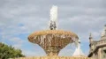 Clear water sprays splashing in fountain on Moyua square in Bilbao downtown HD Footage