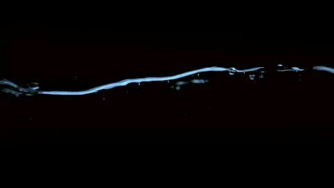 Clear water surface on a black blue ripple Stock Footage 82699007