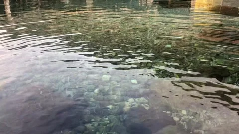 Clear Water Surface with Gentle Ripples Stock Footage 331103630