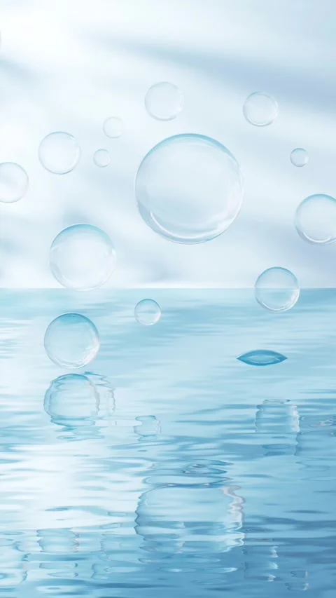 Clear water surface with light blue bubbles floating above and reflecting b.. Stock Footage 328332544