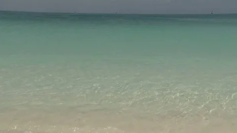 Clear water waves on island beach Stock Footage 74072964