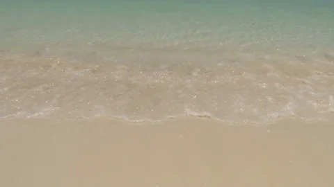 Clear water waves on island beach Stock Footage 74072971