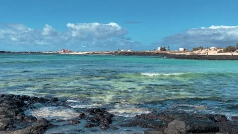 The clear waters at Playa El Cotillo El Cotillo Stock Footage 239634101