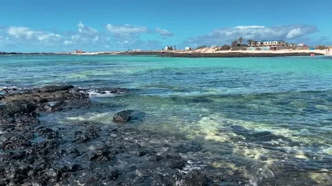 The clear waters at Playa El Cotillo El Cotillo Stock Footage 239634116
