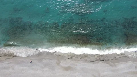 The Clear Waves On The Beach in Alanya Turkey by Aerial Drone Video Stock Footage