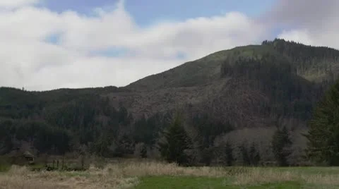 Clearcut Oregon Hillside Timelapse over Cloudy Valley Stock-Footage 22103122