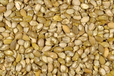 Cleared pumpkin seeds background Stock Photos