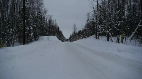 Cleared Scenic Winter Road Surrounded by Trees Stock Footage 38077892