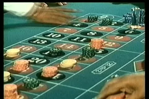 Clearing chips off roulette table Stock-Footage 11345962