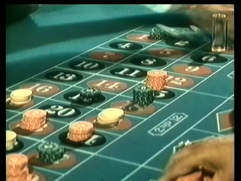 Clearing chips off roulette table Video stock 260247479