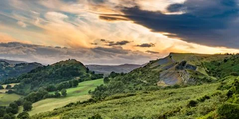 Clearing clouds at sunset over Llangollen panorama Stock Photos