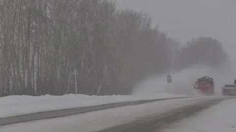 Clearing the road from snow Stock Footage 55576836