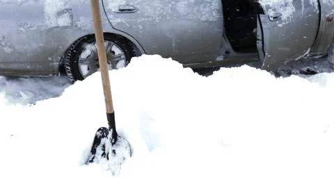 Clearing the road from snow manually Stock Photos