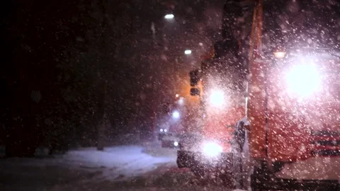 Clearing roads during a winter snowstorm Video stock 342388105