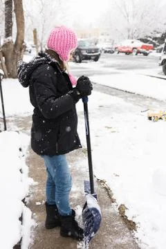 Clearing sidewalks after snow storm Stock Photos