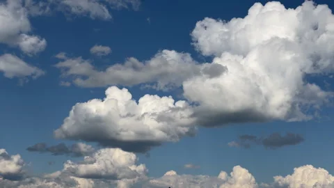Clearing sky time lapse with cumulus cloud and sunny weather transition Stock Footage 339501001