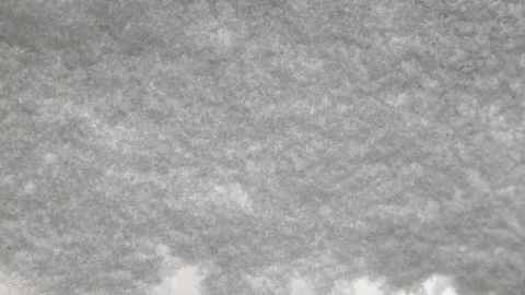 Clearing snow from the windscreen with a brush Stock-Footage 73436563