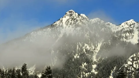 Clearing winter mist, Snoqualmie Pass, Time Lapse Stock Footage 74401293