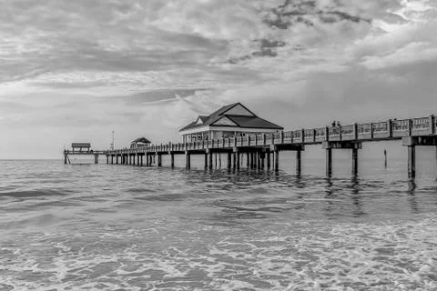 Clearwater Beach, Florida. Partial view of Pier 60 on cloudy sky background Stock Photos