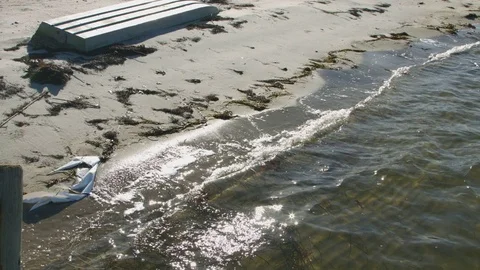 Clearwater splashing onto the sand Stock Footage 75170708