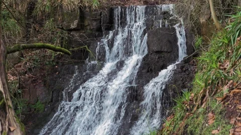 Cleddon Falls waterfall AONB River Wye, water cascades over layers of rock Stock Footage 69069605
