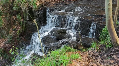 Cleddon Falls waterfall AONB River Wye, water cascades over layers of rock.mp Video stock 69069622