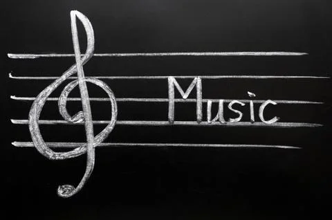 Clef on a blackboard Stock Photos
