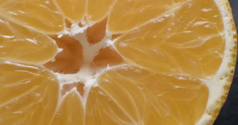 Clementine macro rotating studio 4K Stock Footage 144799364