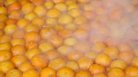 Clementines cooking Close-Up 動画素材 308816931