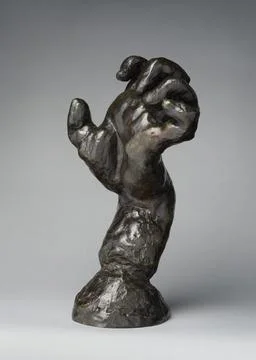 The Clenched Left Hand (Study for Hand of Pierre de Wiessant) modeled ca. 1.. Stock Photos