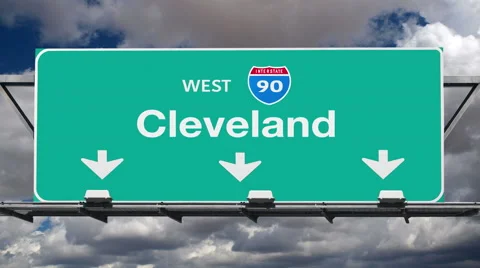 Cleveland Interstate 90 Overhead Highway Sign with Time Lapse Clouds Stock Footage