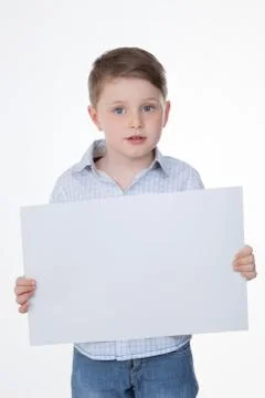 Clever boy holding blank panel 스톡 사진