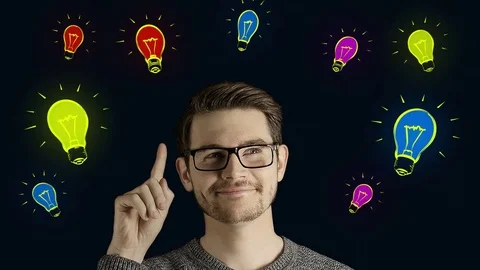 Clever creative man think gets an idea, which jumps up as symbolic colored Stock Footage 74467394