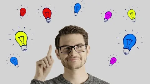 Clever creative man think gets an idea, which jumps up as symbolic colored Stock Footage 74471891