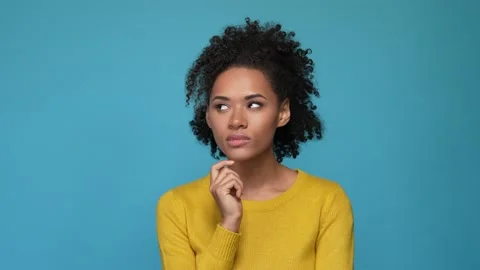 Clever lady decide thoughts decision isolated blue color background Video stock 167603039