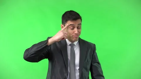 Clever man in suit pointing to head Vídeos de archivo 172234770